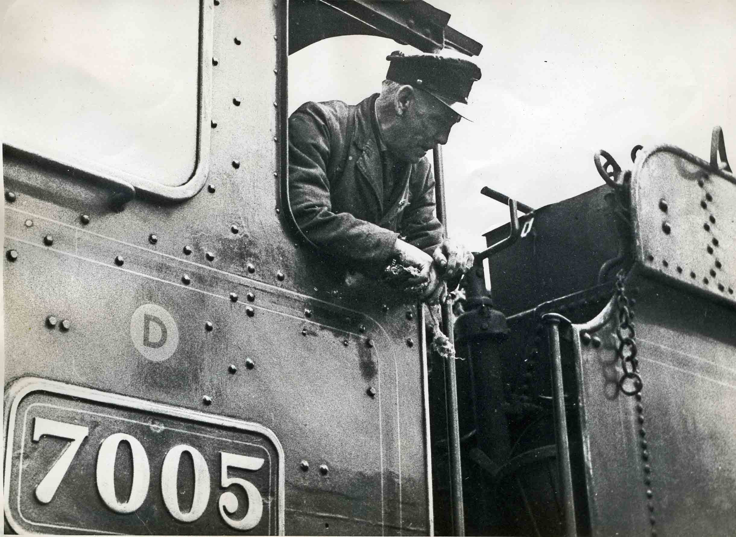 Ted Crocker on the footplate of No.7005